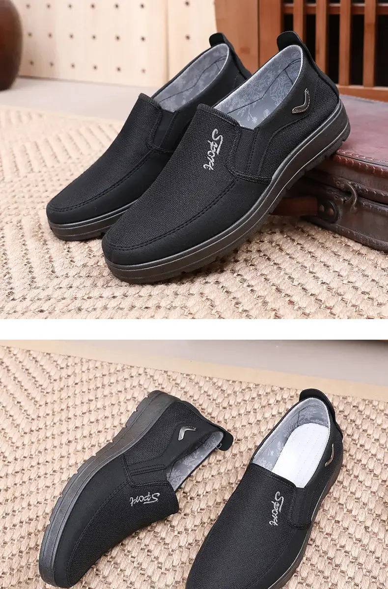 Black slip-on casual shoes with gray lining, ideal cloth shoes men’s for big yards.