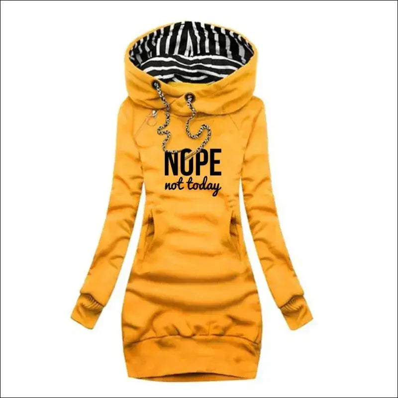 Yellow hooded sweatshirt dress with ’NOPE not today’ text printed on the front.