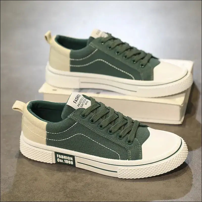 Green canvas sneaker with white rubber sole and toe cap.