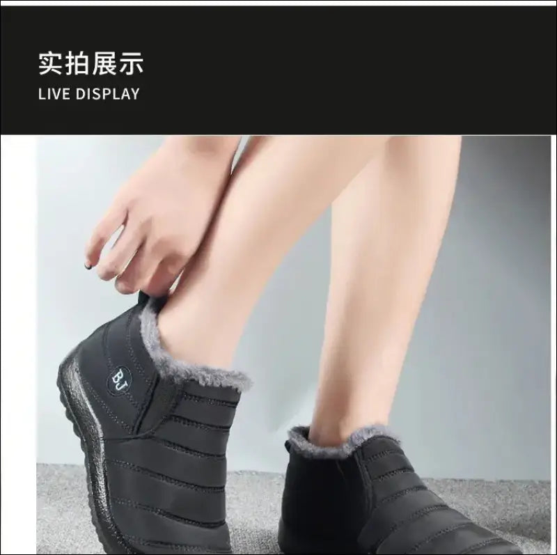 Black fur-lined winter ankle boots with a slip-on design.