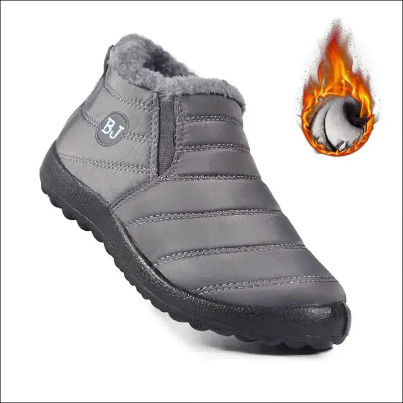 Gray quilted slip-on winter boot with a rugged sole.